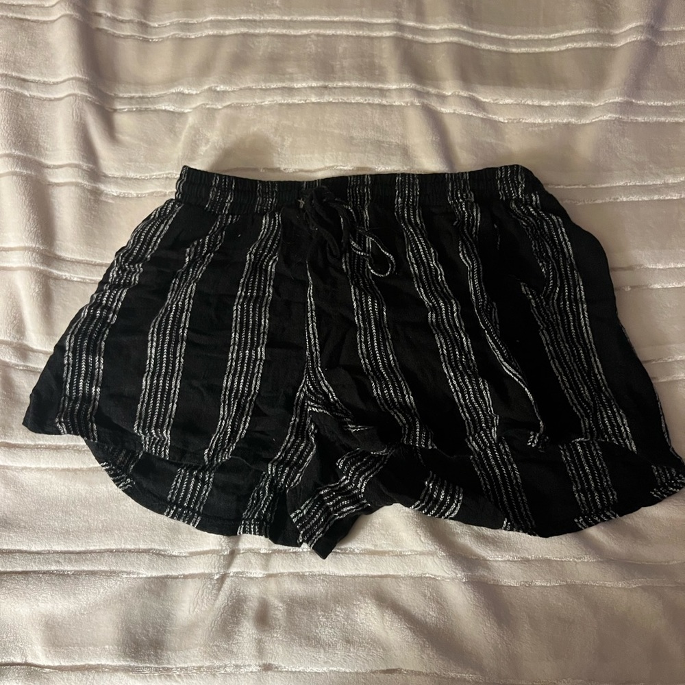 Black and white striped stretchy shorts with pockets size m